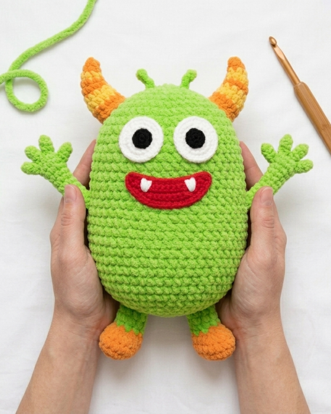 Hands holding green Doodle